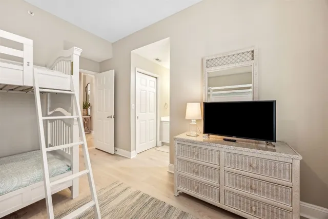 a room with furniture and flat screen tv