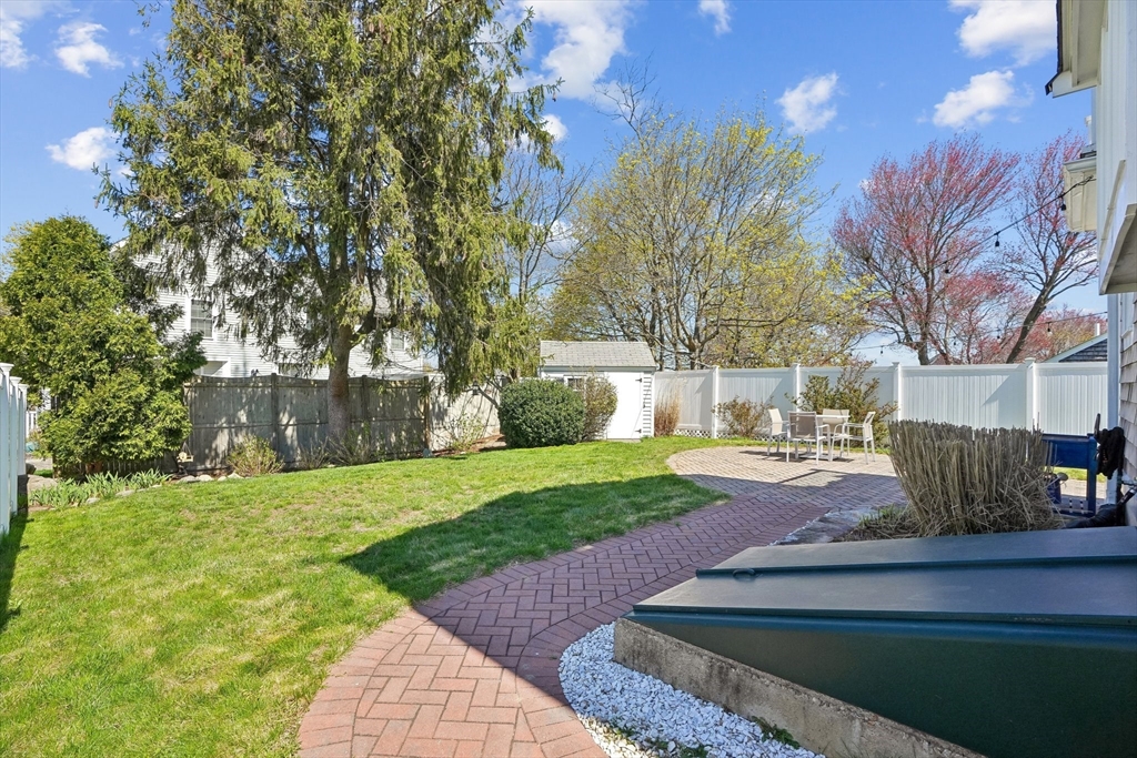 12 Hawley Road Scituate, MA 02066 - Photo 21 of 24 a front view of a house with garden