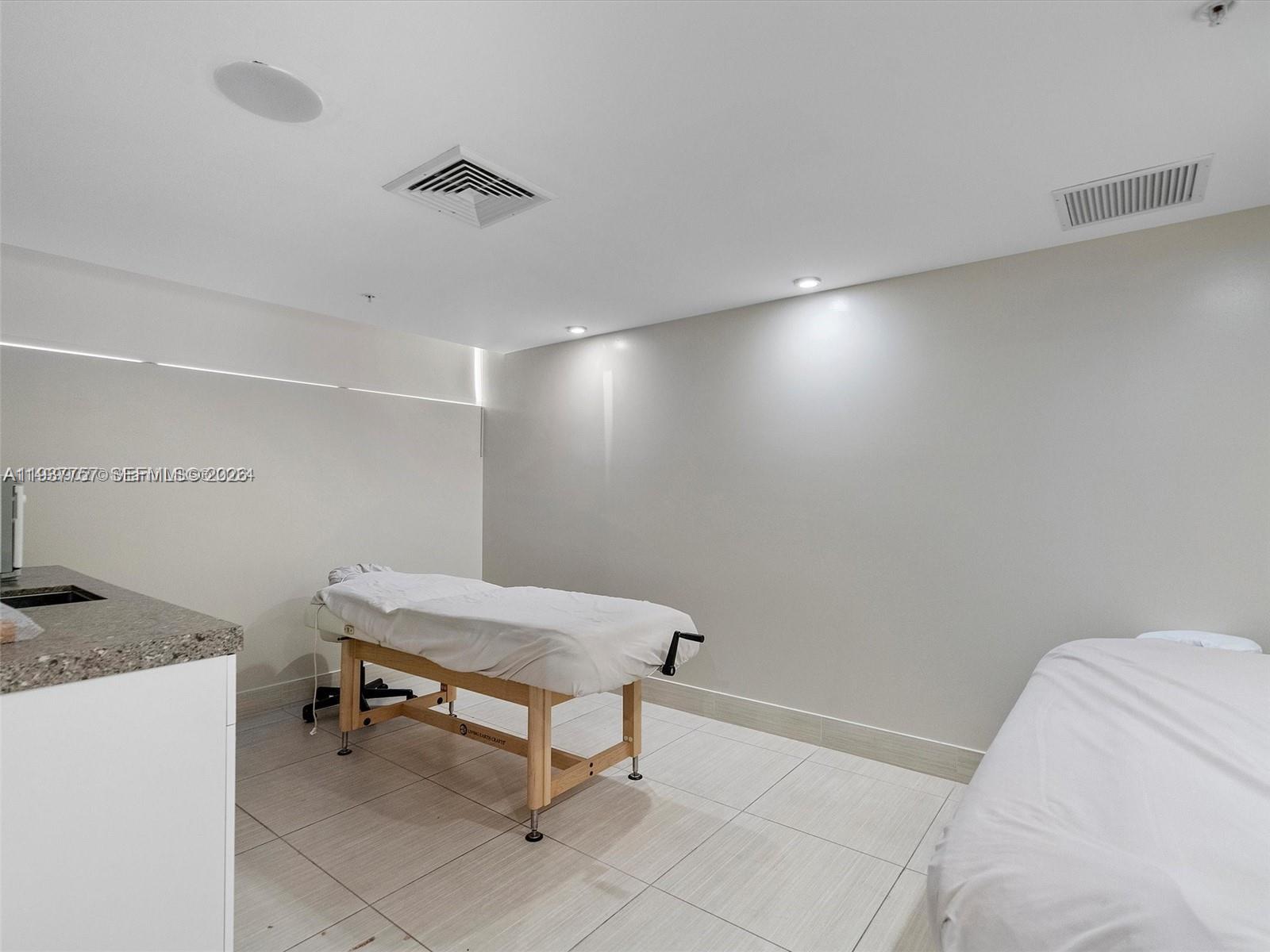 92 Southwest 3rd Street, Unit 4109 Miami, FL 33130 - Photo 16 of 23 a room with a table and chairs