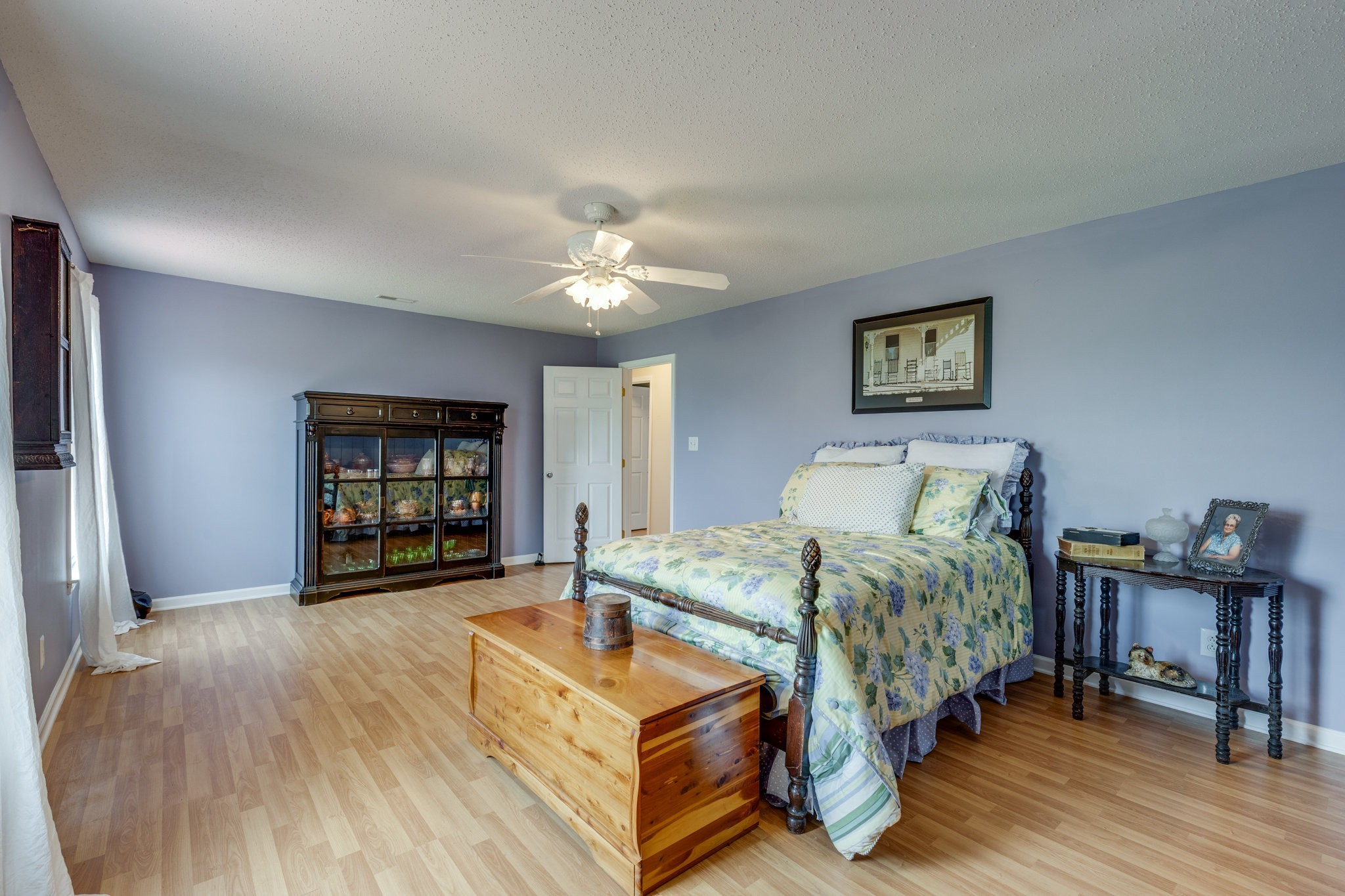 1087 Charley Davis Road Goodspring, TN 38460 - Photo 29 of 80 a spacious bedroom with a bed and a table in it