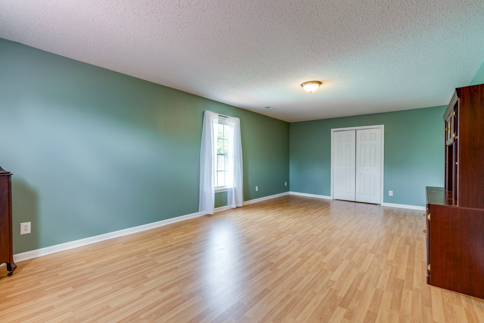 1087 Charley Davis Road Goodspring, TN 38460 - Photo 39 of 80 a view of an empty room with wooden floor