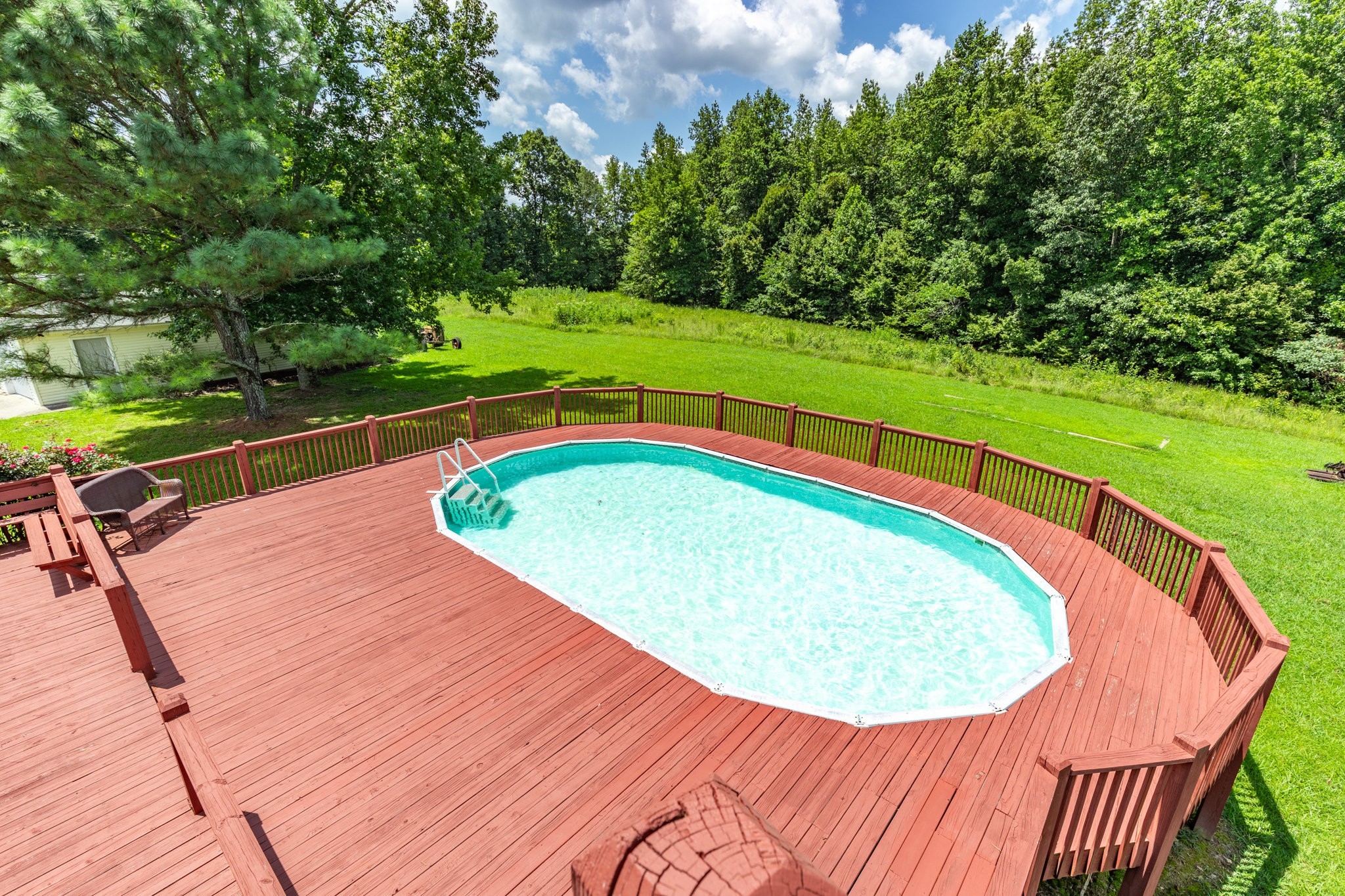 1087 Charley Davis Road Goodspring, TN 38460 - Photo 48 of 80 a view of a swimming pool with a garden and plants