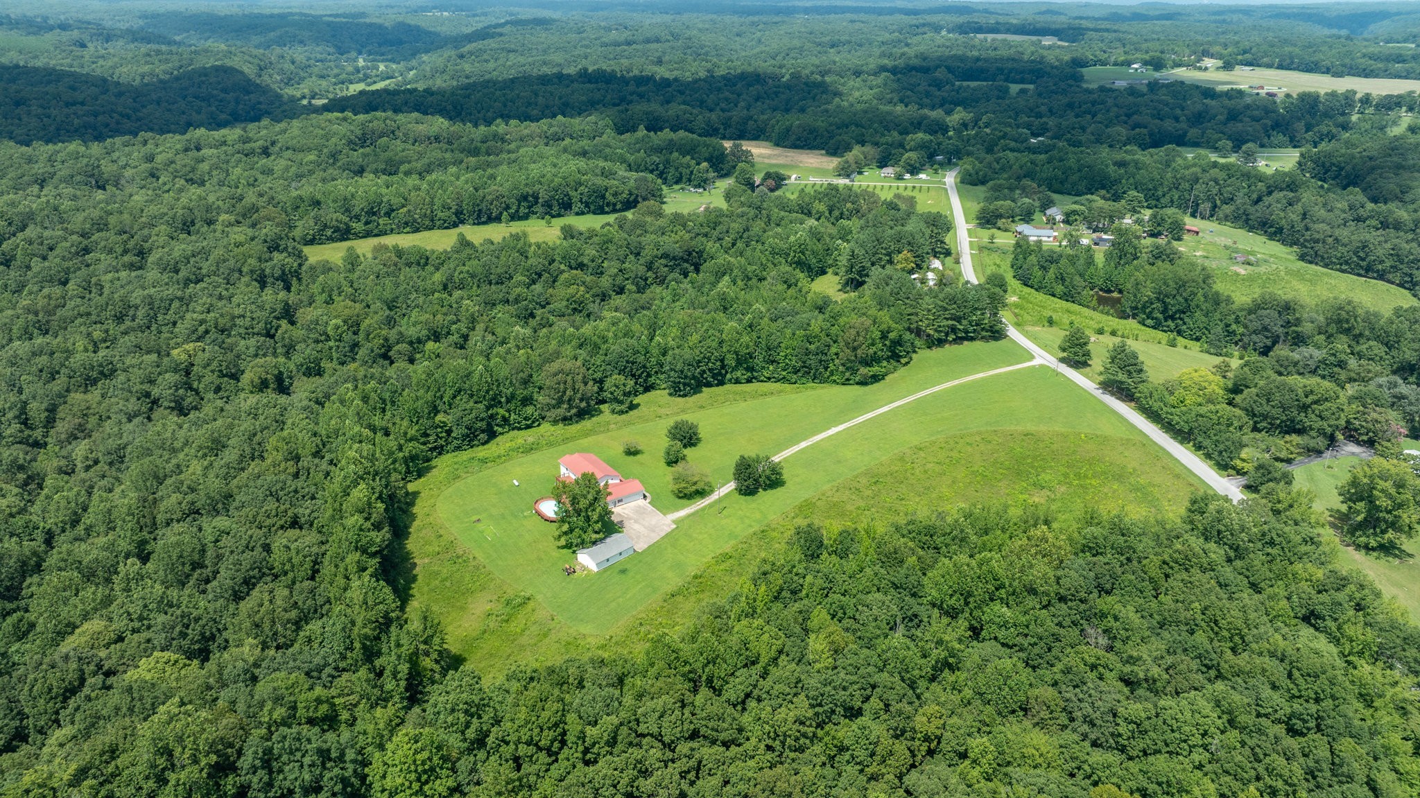 1087 Charley Davis Road Goodspring, TN 38460 - Photo 55 of 80 an aerial view of a house with a yard