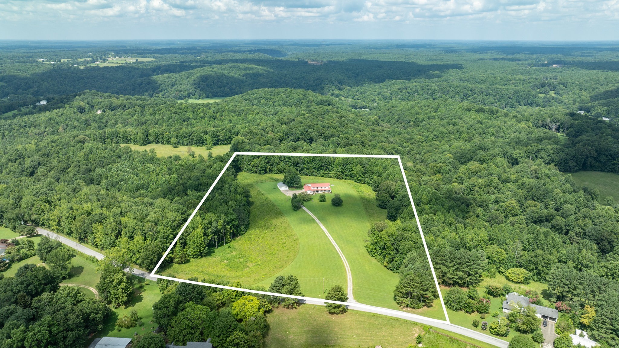 1087 Charley Davis Road Goodspring, TN 38460 - Photo 58 of 80 a view of a yard and deck