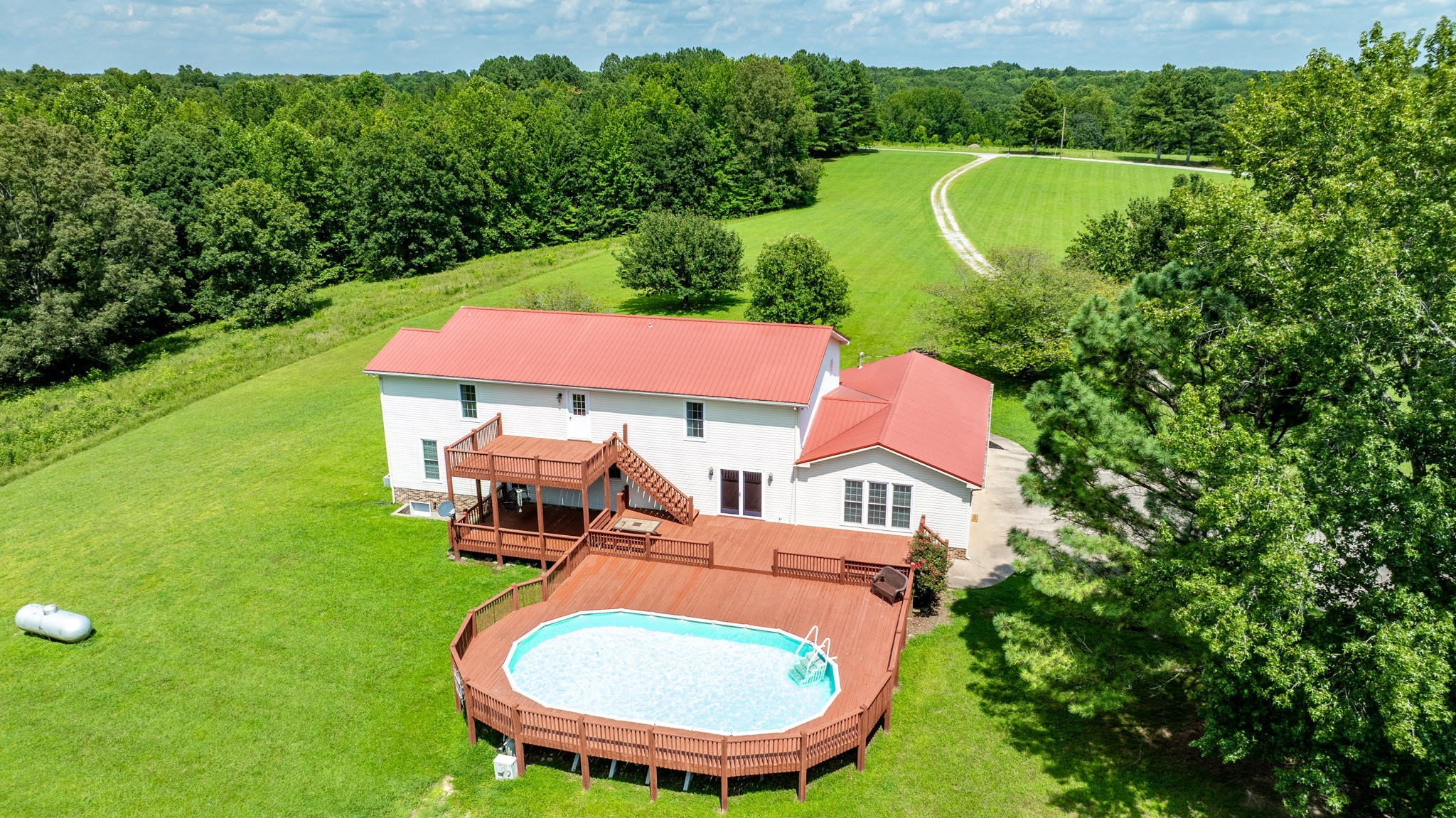 1087 Charley Davis Road Goodspring, TN 38460 - Photo 68 of 80 an aerial view of a house with swimming pool and garden view