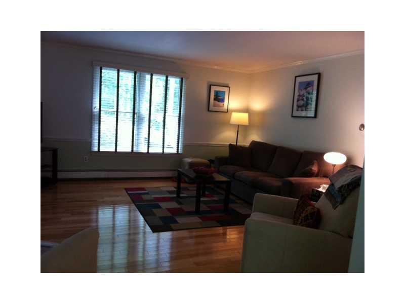 12 Juniper Road Brunswick, ME 04011 - Photo 3 of 18 Living Room. LIving room windows...