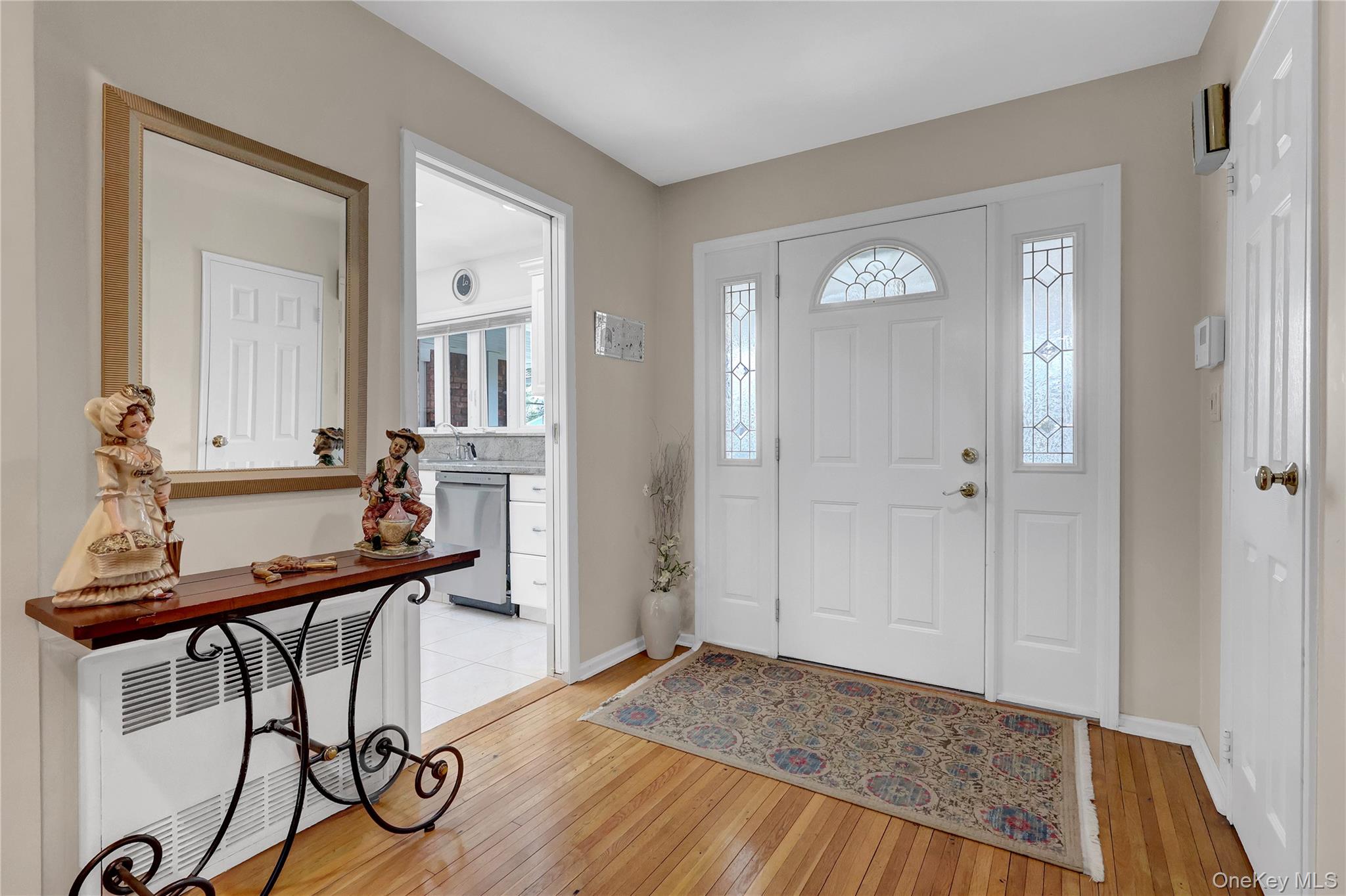 27 Cedar Street Syosset, NY 11791 - Photo 4 of 28 a view of room with furniture and wooden floor