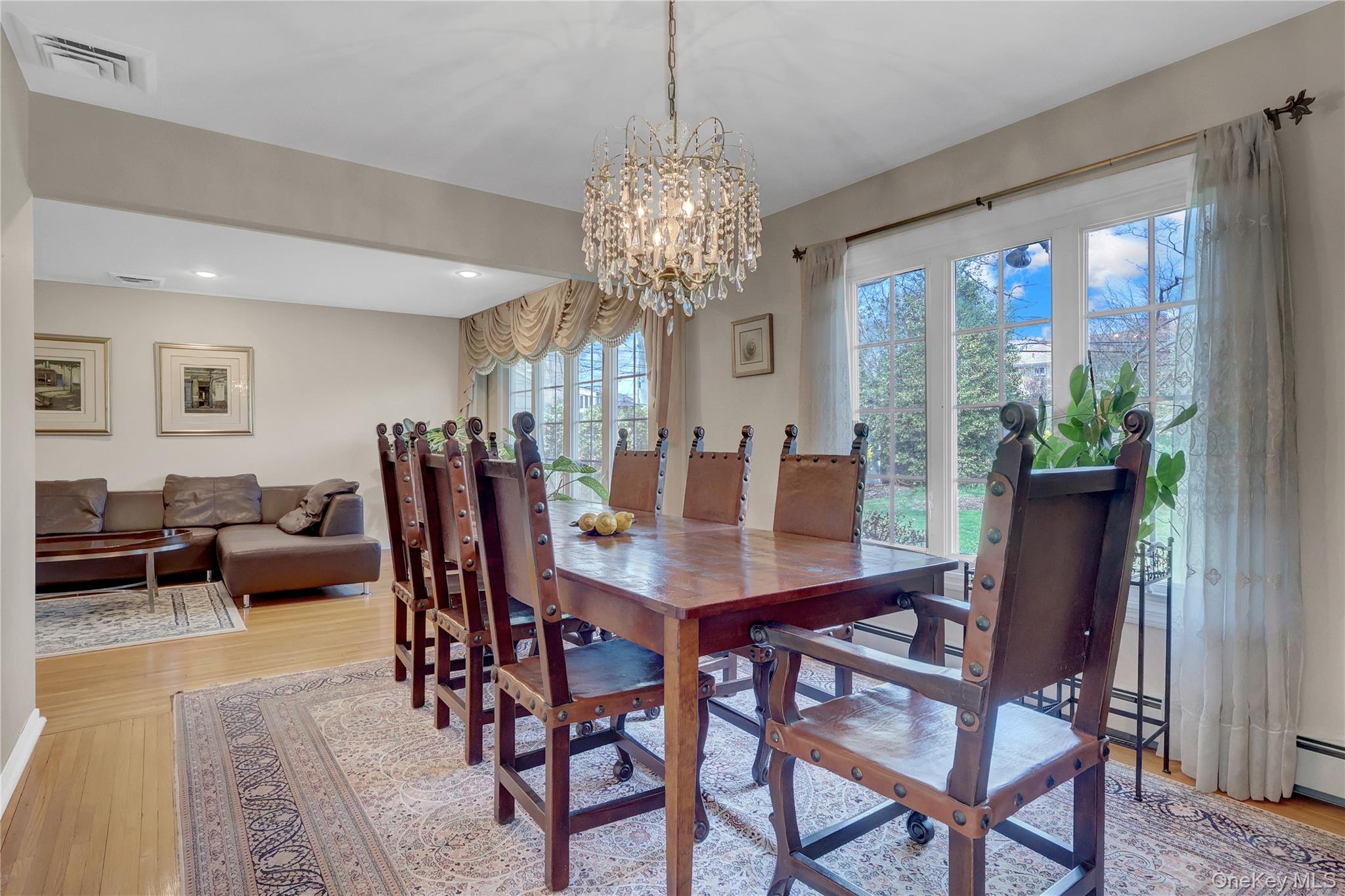 27 Cedar Street Syosset, NY 11791 - Photo 8 of 28 a view of a dining room with furniture window and wooden floor