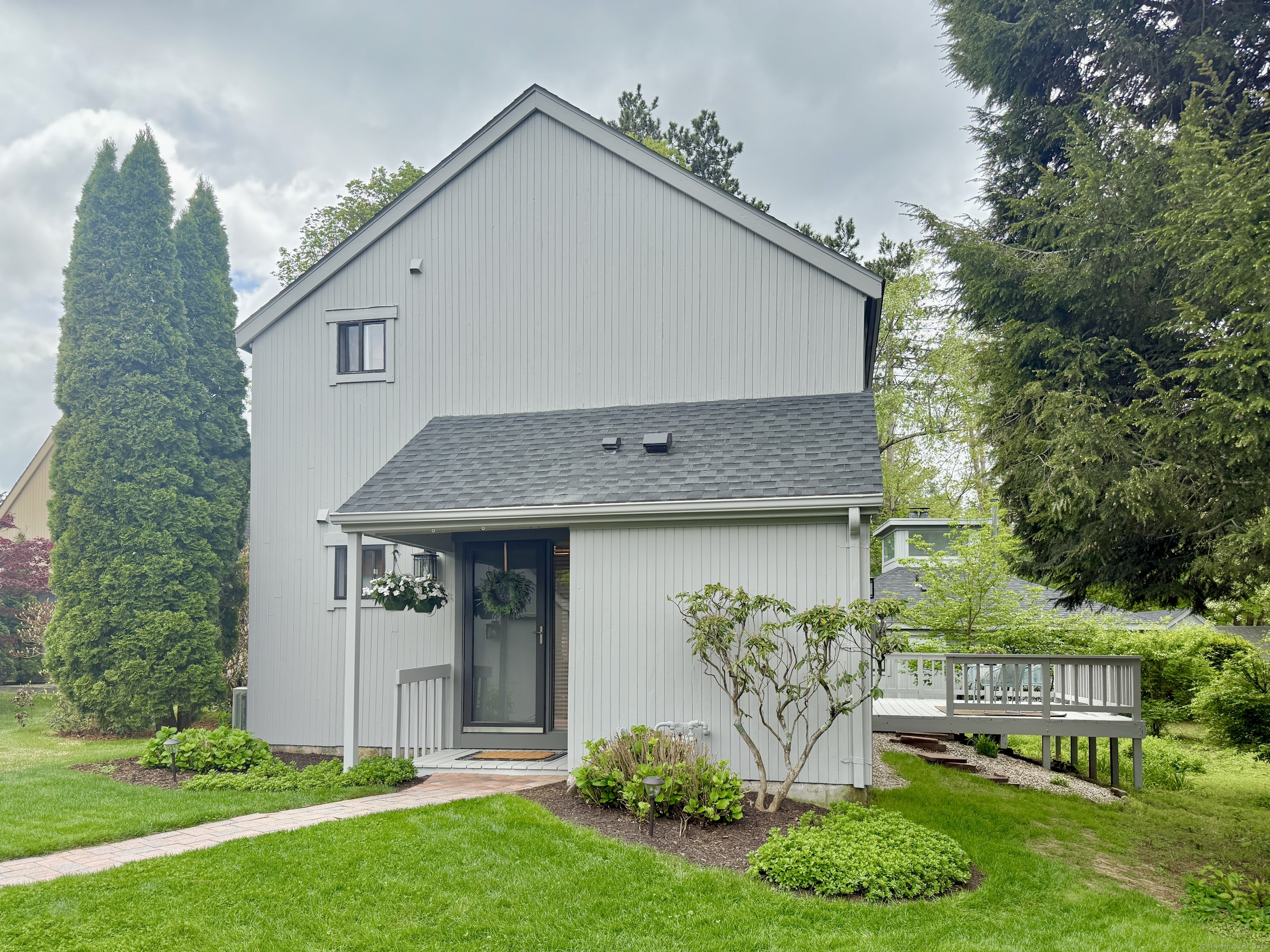 front view of a house with a yard