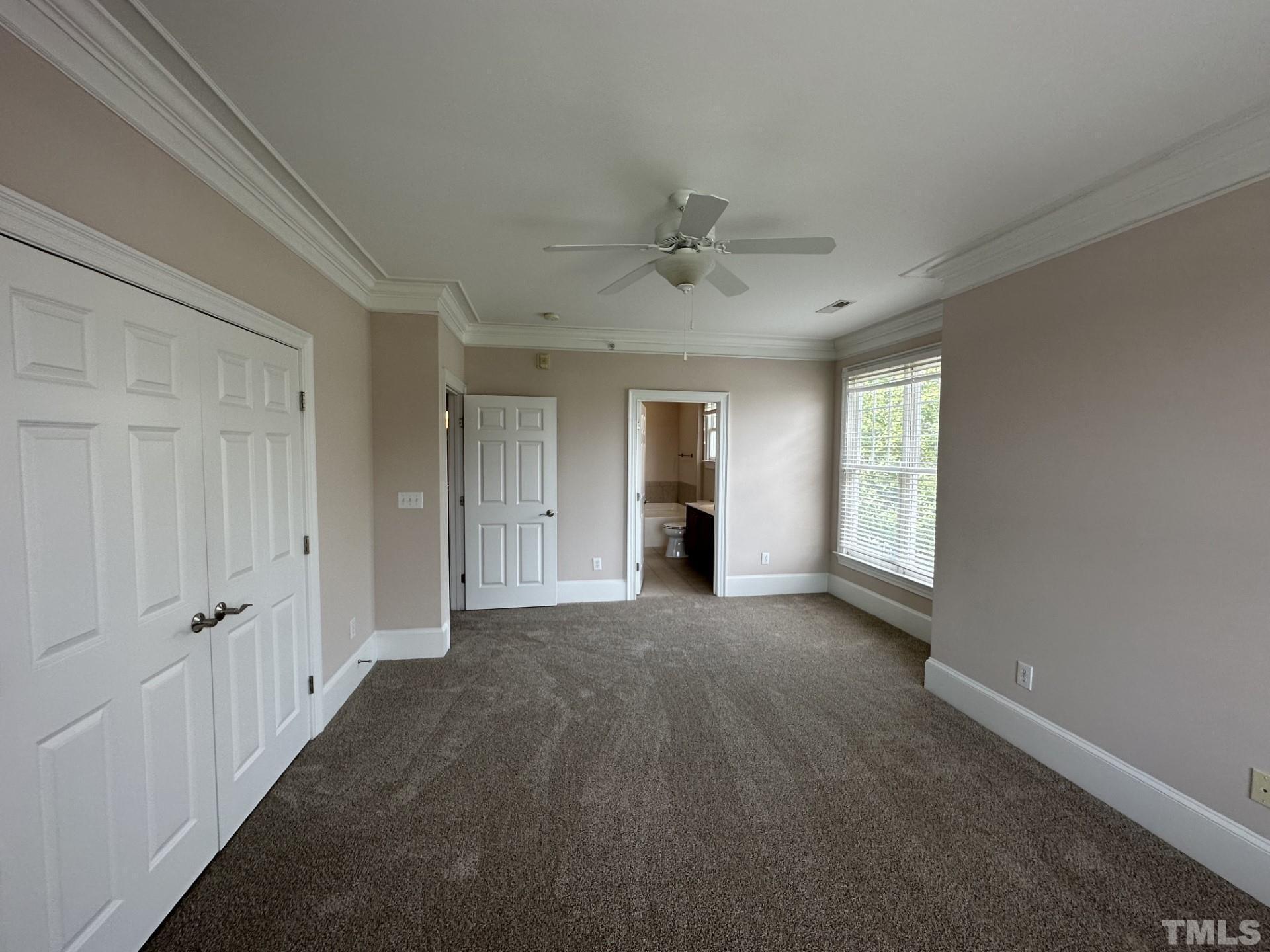 623 Waterford Lake Drive, Unit 623 Cary, NC 27519 - Photo 14 of 18 a view of an empty room with a window