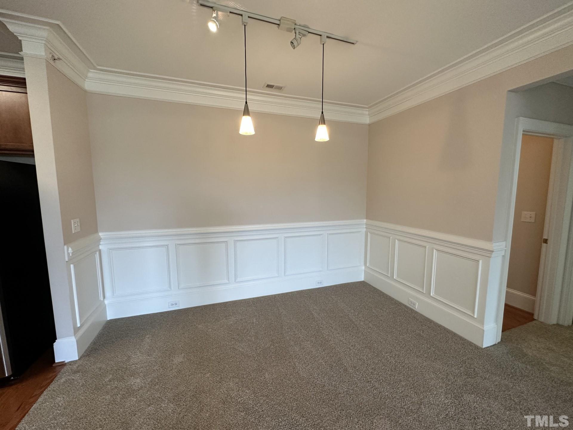 623 Waterford Lake Drive, Unit 623 Cary, NC 27519 - Photo 9 of 18 a view of an empty room with a window