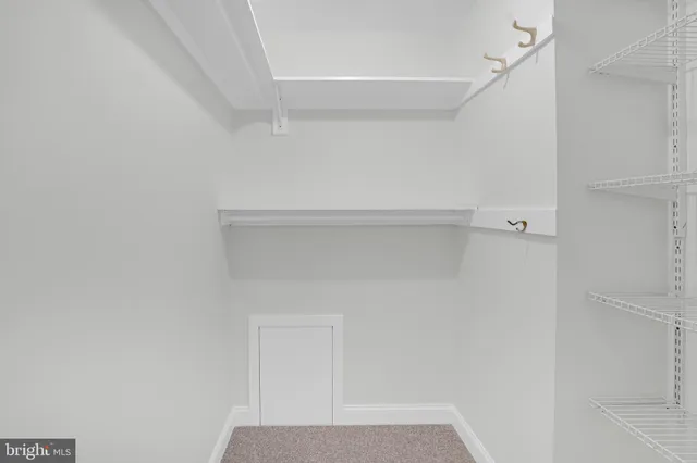 a view of small space with racks on the wall