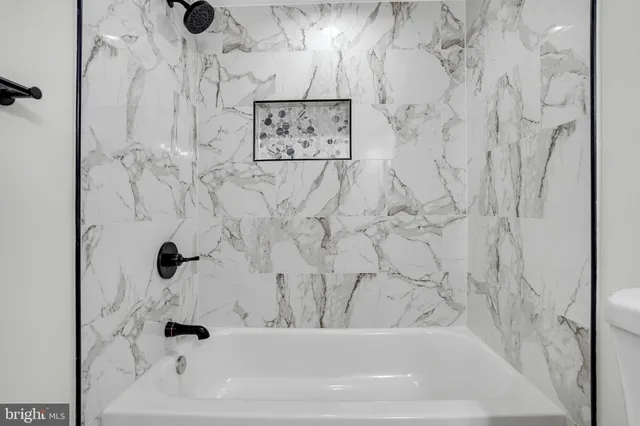 a bathroom with a bathtub