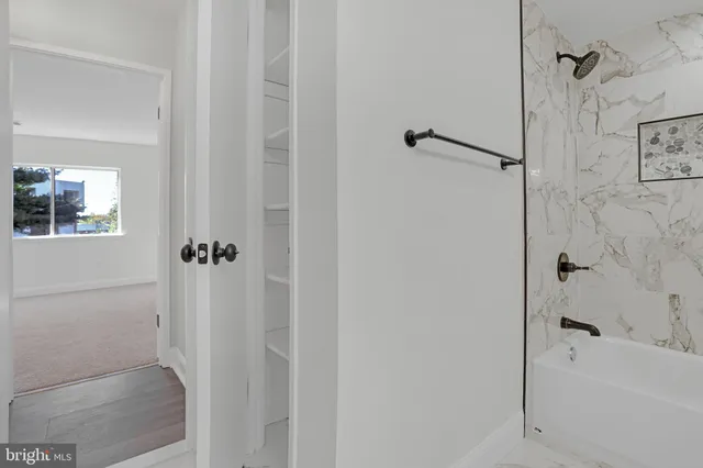 a bathroom with a bathtub