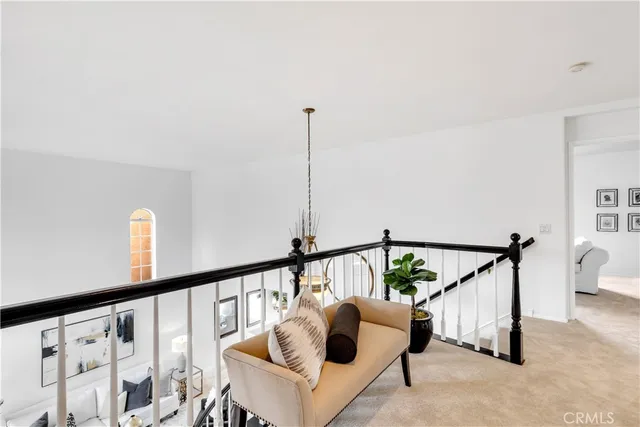 a view of staircase with furniture