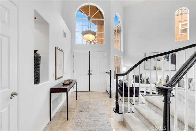 a view of front door with stairs