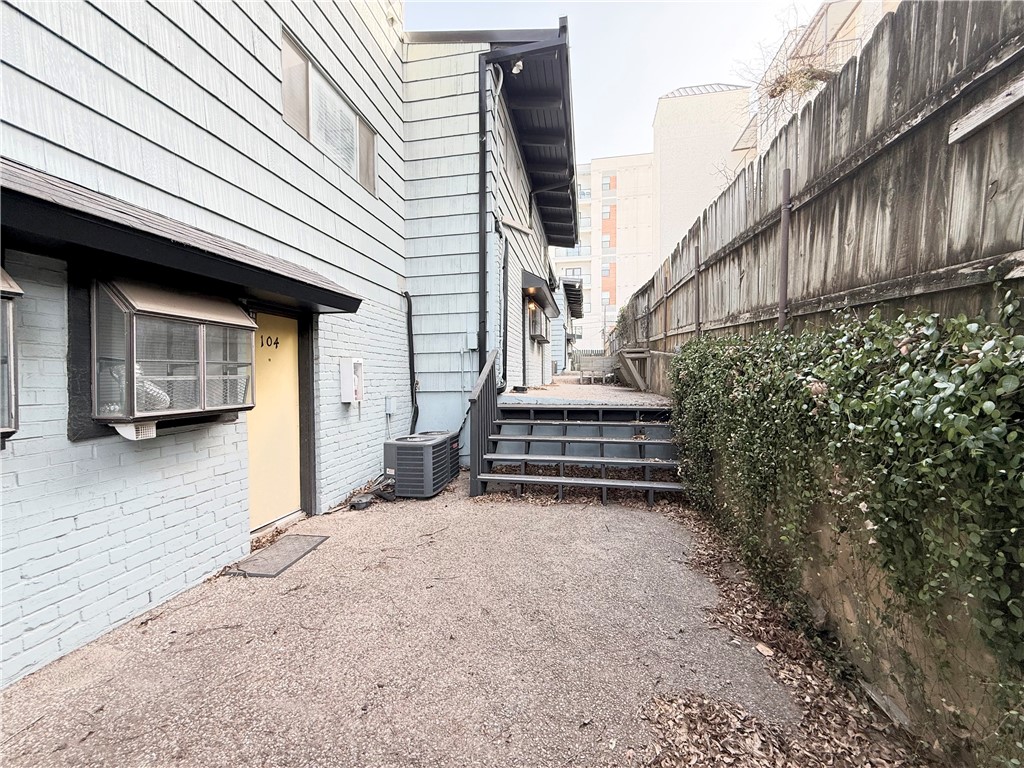 2413 Leon Street, Unit 108 Austin, TX 78705 - Photo 19 of 21 a view of a house with a yard