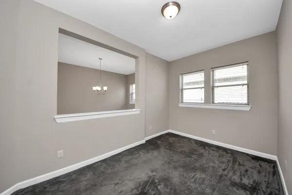 an empty room with windows
