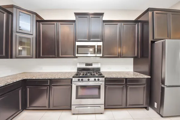 a view of a granite countertop cabinets and a sink