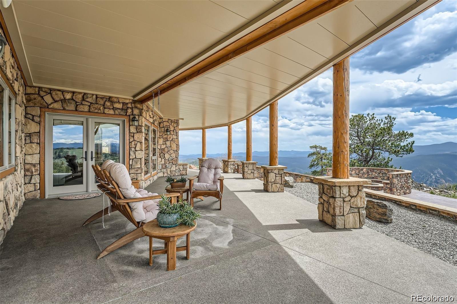 401 Raptor Point Golden, CO 80403 - Photo 11 of 44 a building outdoor space with patio furniture and garden view