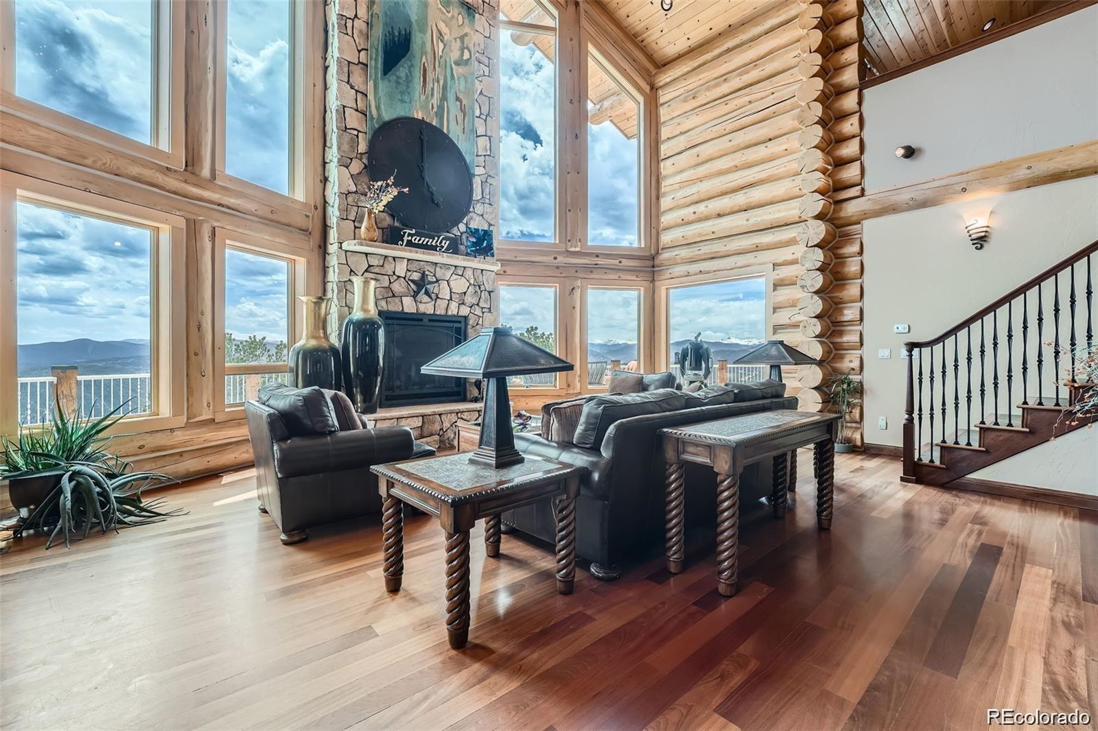 401 Raptor Point Golden, CO 80403 - Photo 2 of 44 a living room with furniture and wooden floor