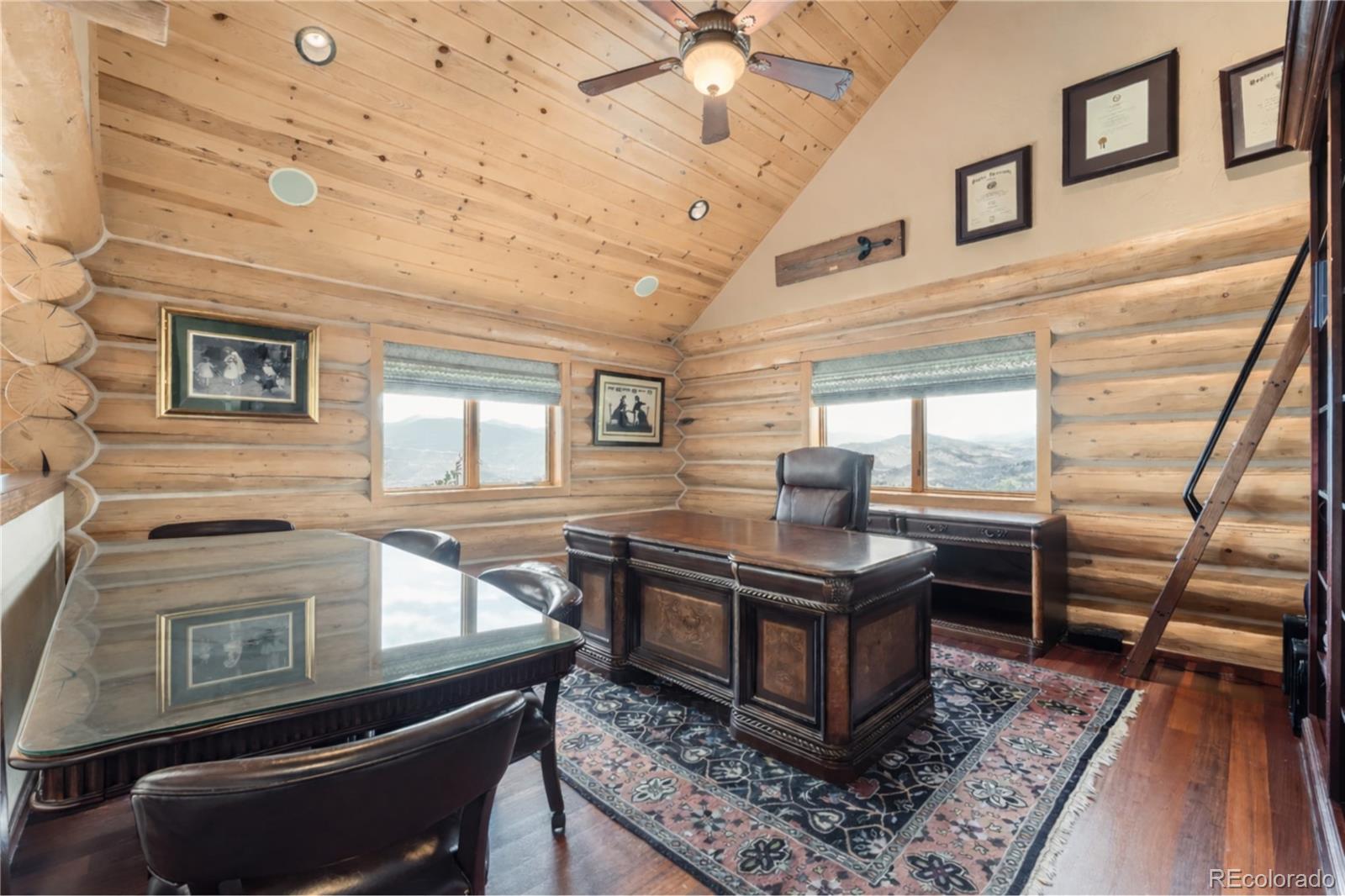 401 Raptor Point Golden, CO 80403 - Photo 21 of 44 a view of a kitchen with a sink and wooden floor