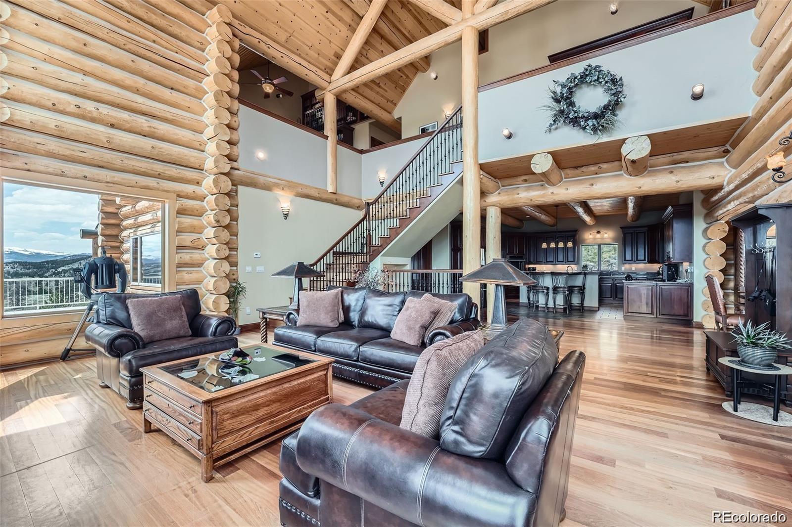 401 Raptor Point Golden, CO 80403 - Photo 26 of 44 a living room with furniture and wooden floor