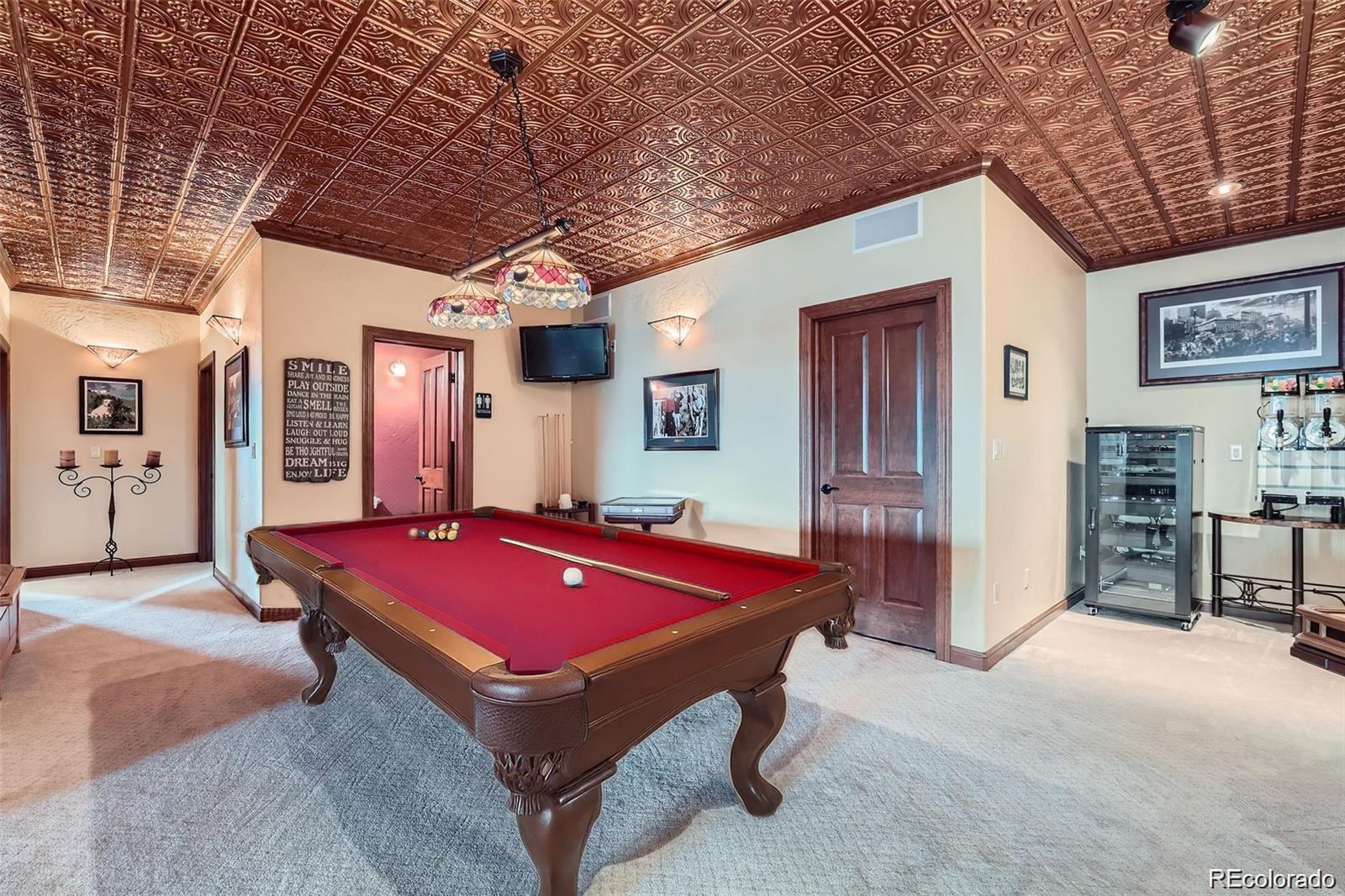 401 Raptor Point Golden, CO 80403 - Photo 35 of 44 a room with pool table and windows