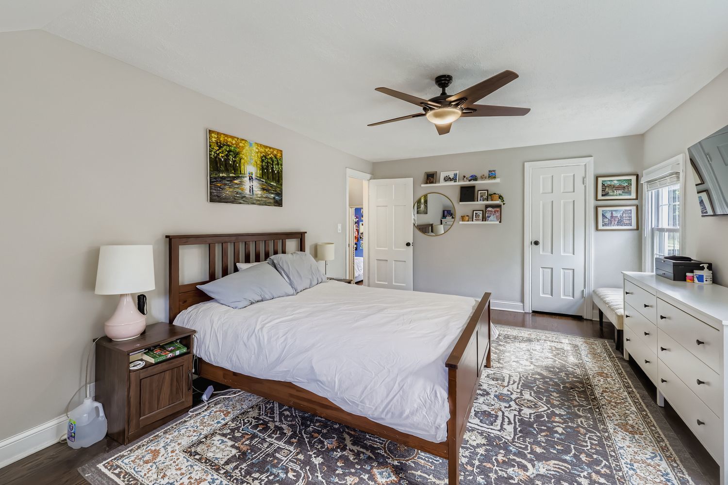 5346 Suffield Terrace Skokie, IL 60077 - Photo 15 of 27 a bedroom with a bed and a dresser