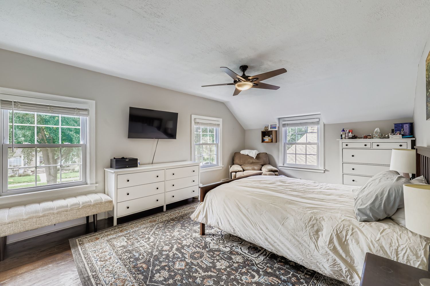 5346 Suffield Terrace Skokie, IL 60077 - Photo 16 of 27 a bedroom with a bed and a dresser