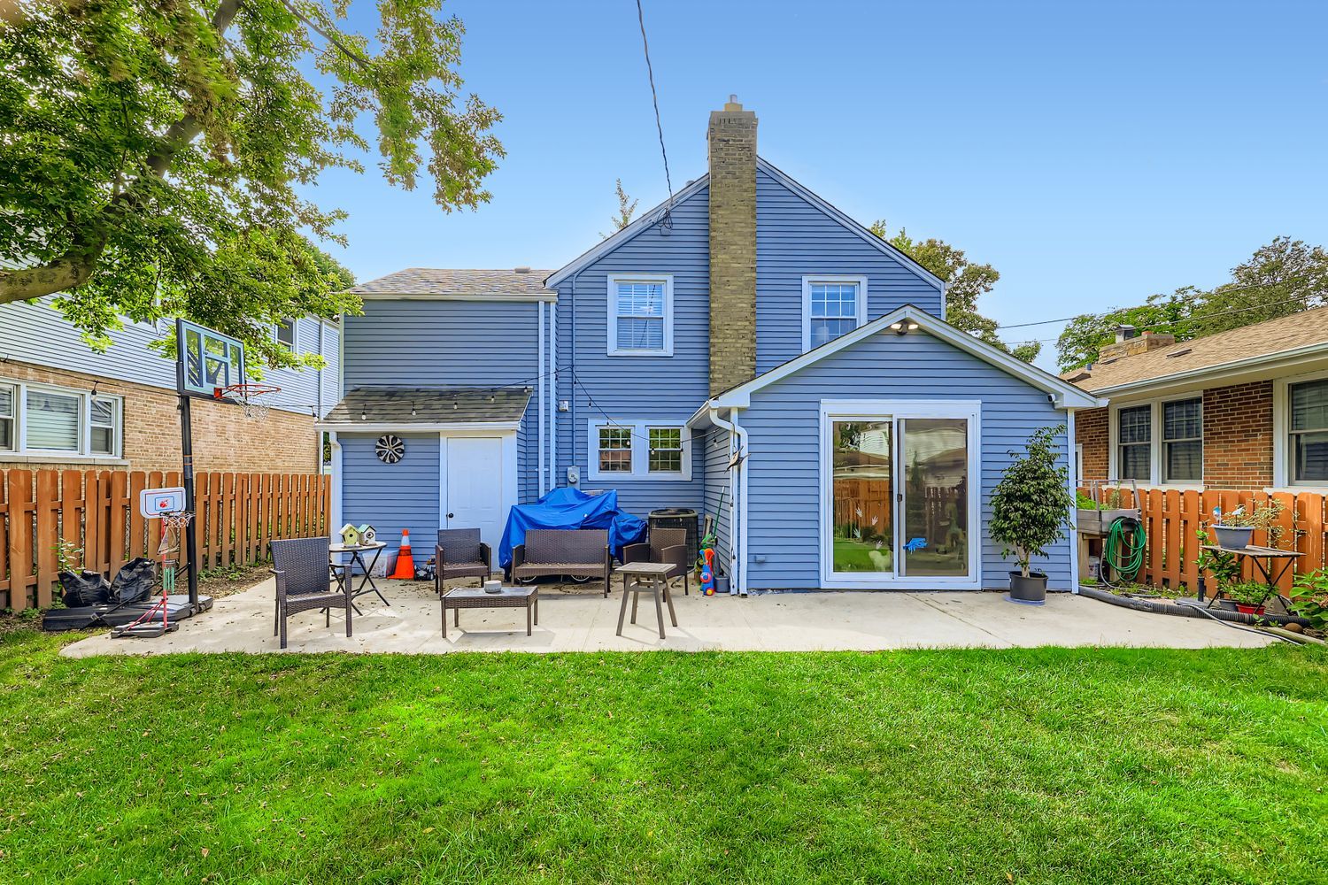5346 Suffield Terrace Skokie, IL 60077 - Photo 26 of 27 a view of a house with a yard porch and sitting area