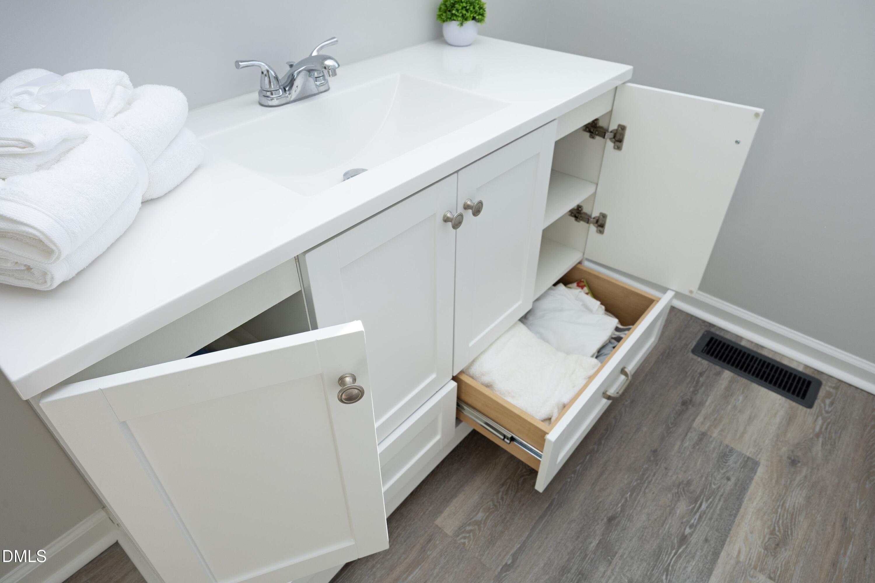 5108 Old Valley Street Raleigh, NC 27603 - Photo 20 of 37 a view of a room with bed and wooden floor