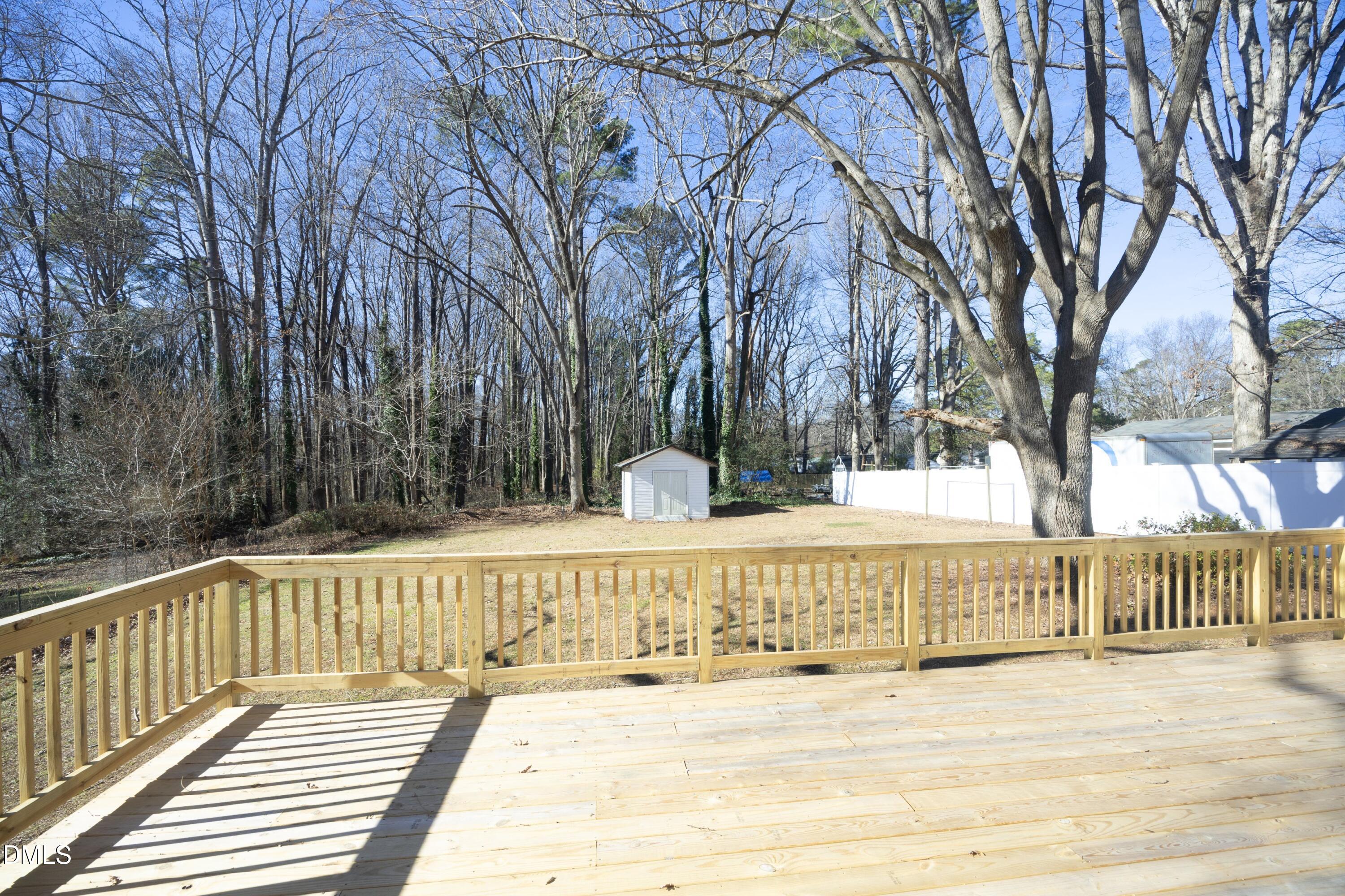 5108 Old Valley Street Raleigh, NC 27603 - Photo 27 of 37 a view of a house with a wooden fence
