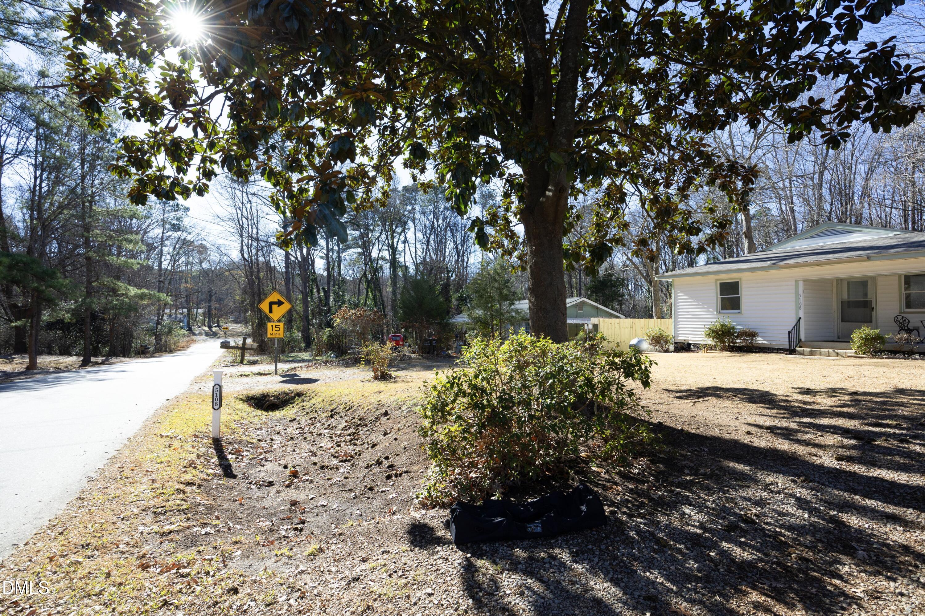5108 Old Valley Street Raleigh, NC 27603 - Photo 2 of 37 a view of a yard with plants and tree