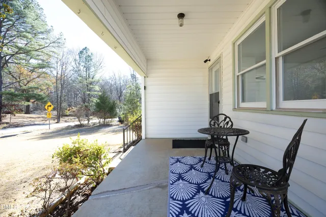 a view of a table and chairs in patio