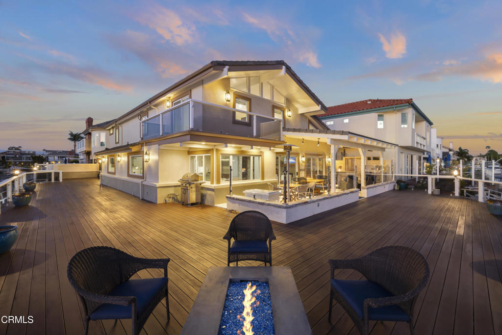 a view of swimming pool with outdoor seating