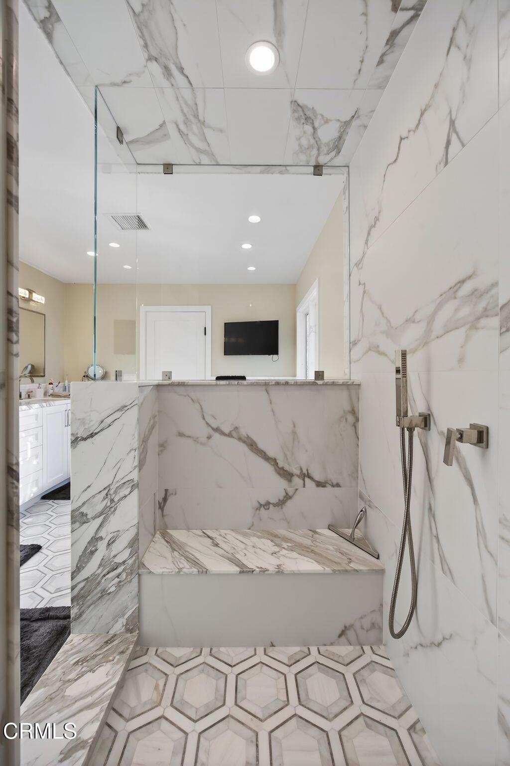 2131 Ravoli Drive Oxnard, CA 93035 - Photo 38 of 53 a bathroom with a sink a toilet and a mirror