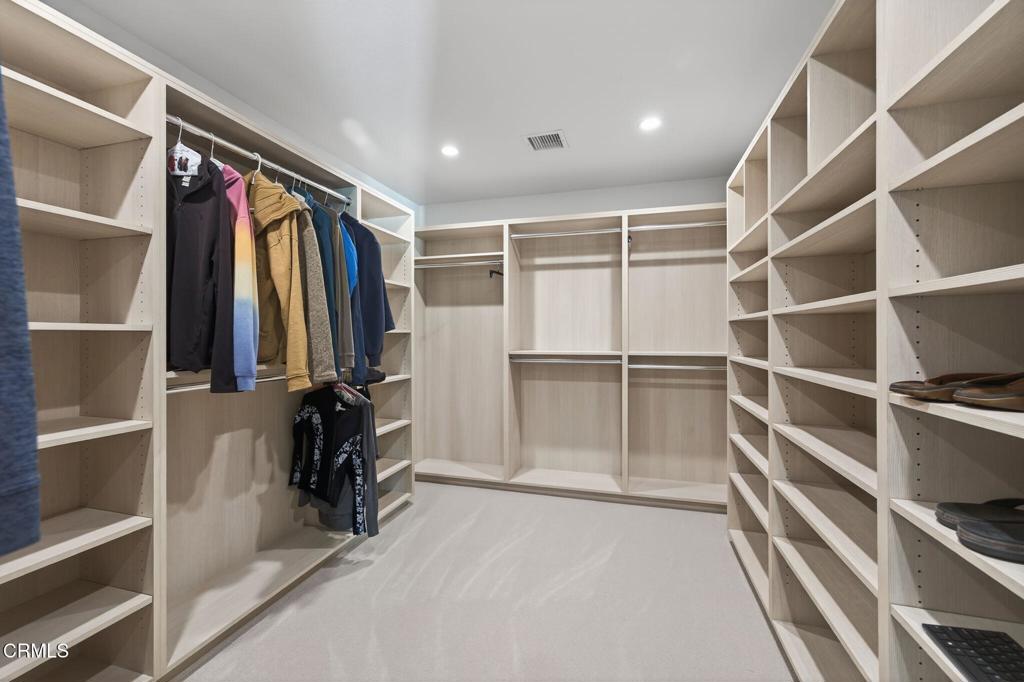 2131 Ravoli Drive Oxnard, CA 93035 - Photo 39 of 53 a view of walk in closet with clothes and shoes