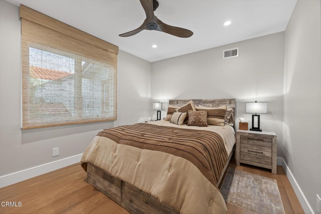2131 Ravoli Drive Oxnard, CA 93035 - Photo 45 of 53 a bedroom with bed and a large window