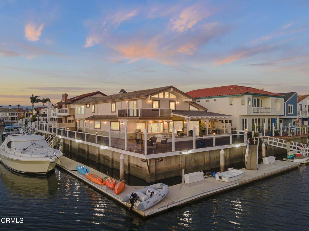 2131 Ravoli Drive Oxnard, CA 93035 - Photo 5 of 53 a view of a lake with a building in the background
