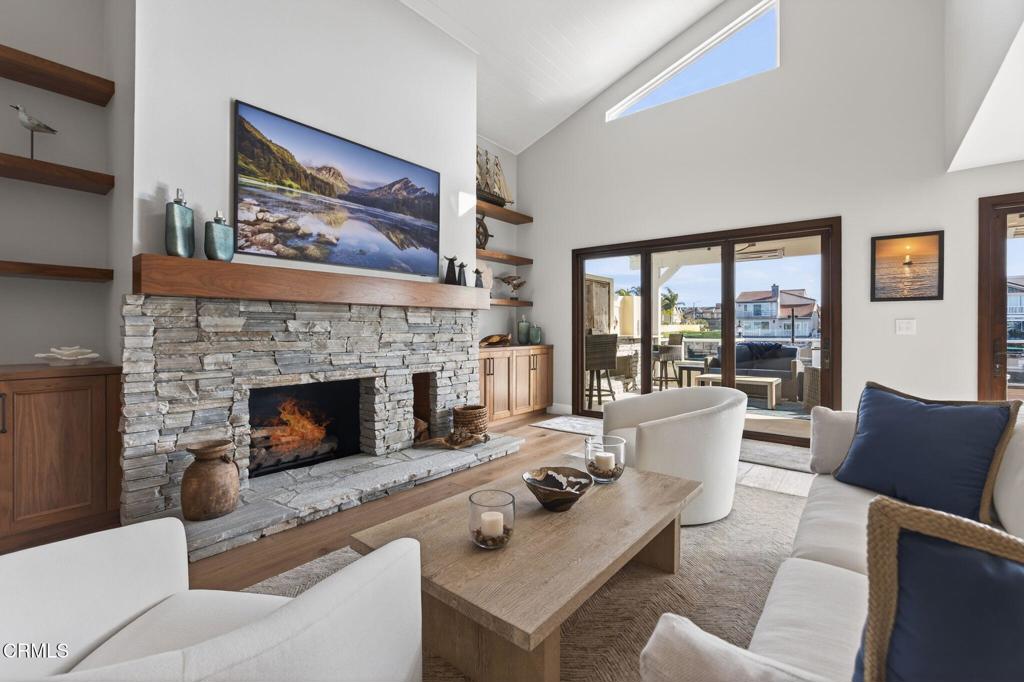 2131 Ravoli Drive Oxnard, CA 93035 - Photo 9 of 53 a living room with furniture and a fireplace