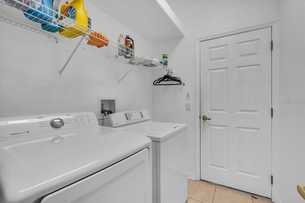 15688 Lemon Fish Drive Lakewood Ranch, FL 34202 - Photo 12 of 18 a utility room with dryer and washer