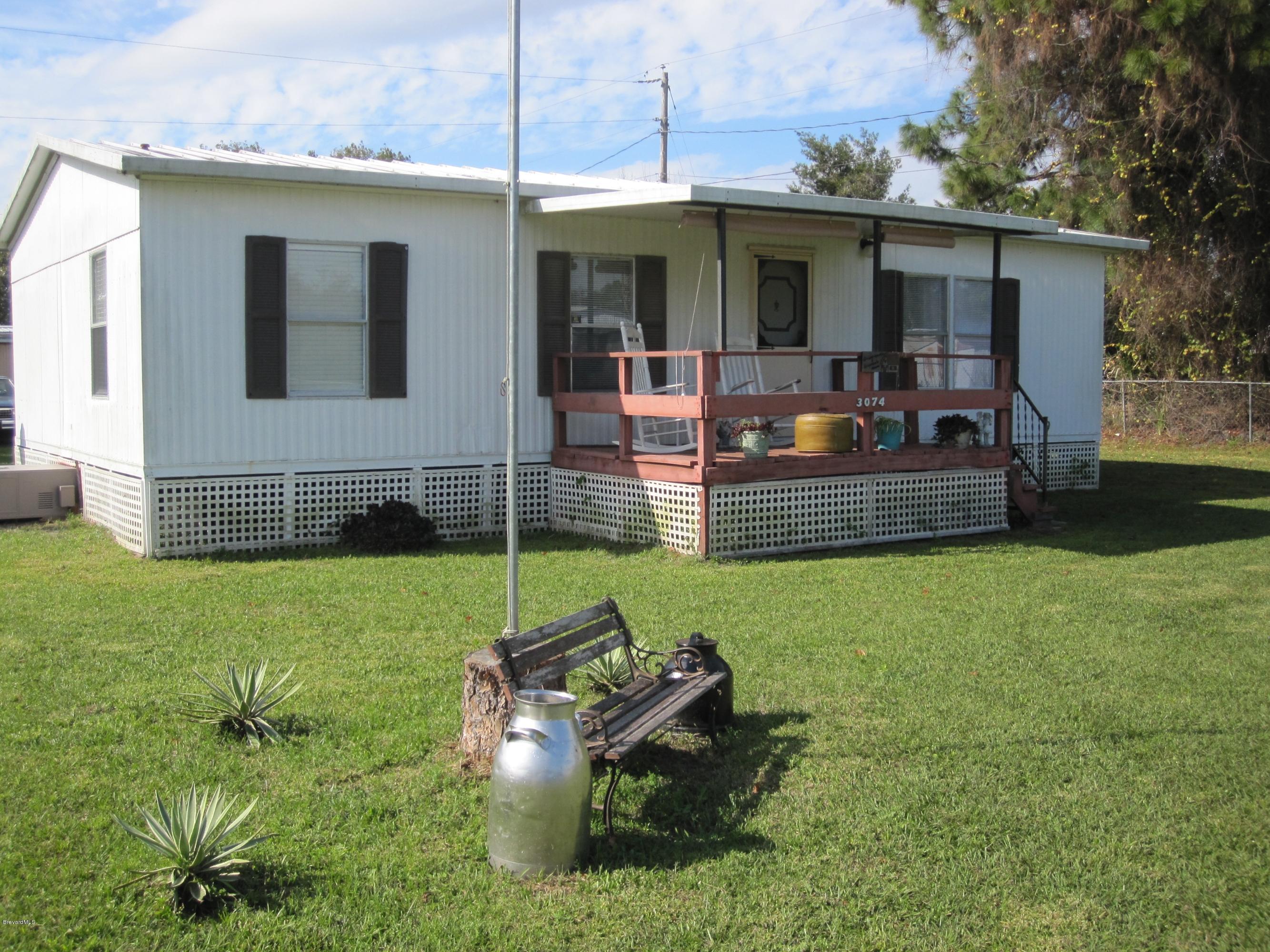 3074 Dover Road Mims, FL 32754 - Photo 1 of 27 Front