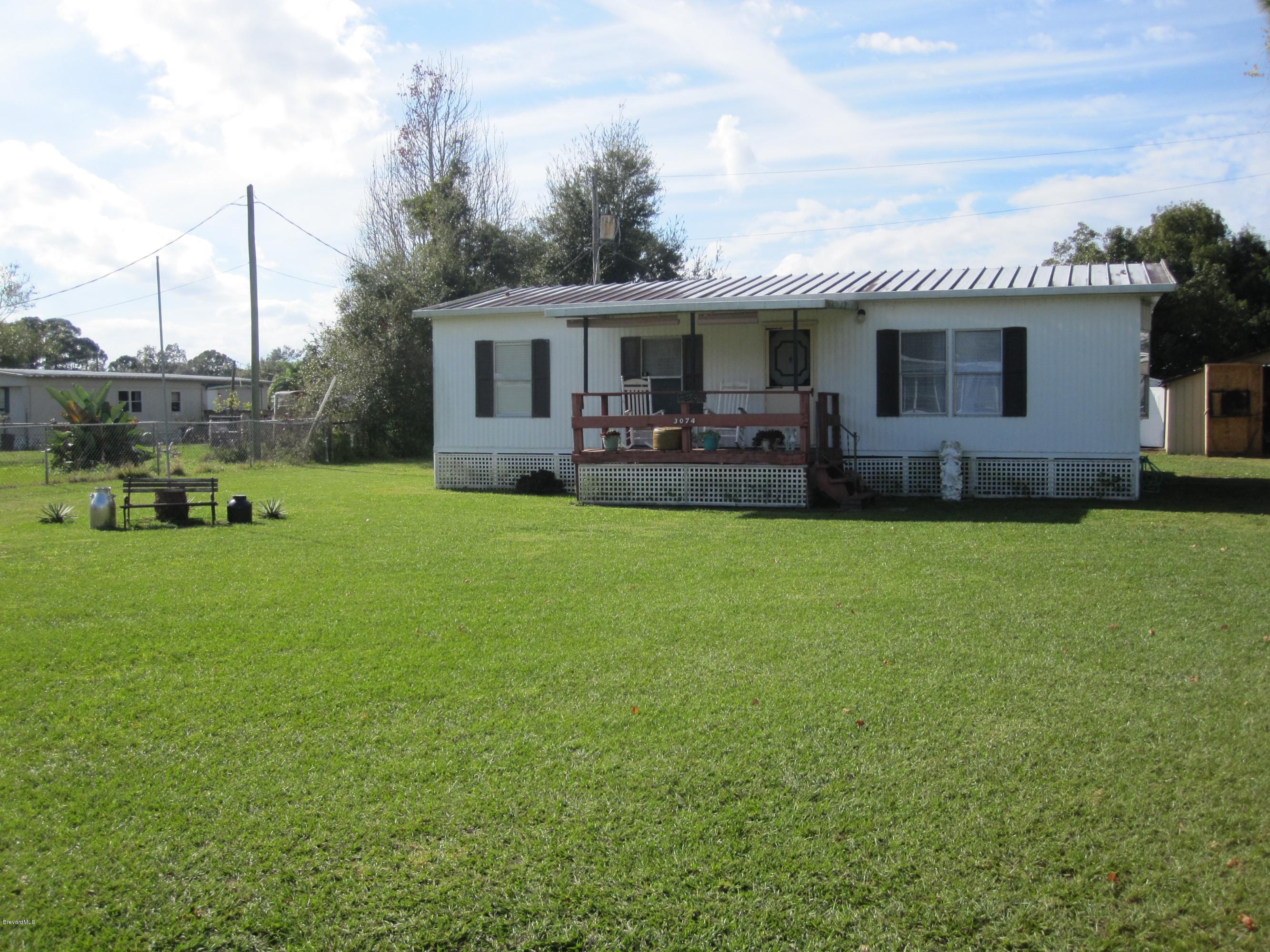 3074 Dover Road Mims, FL 32754 - Photo 2 of 27 Large Front Yard