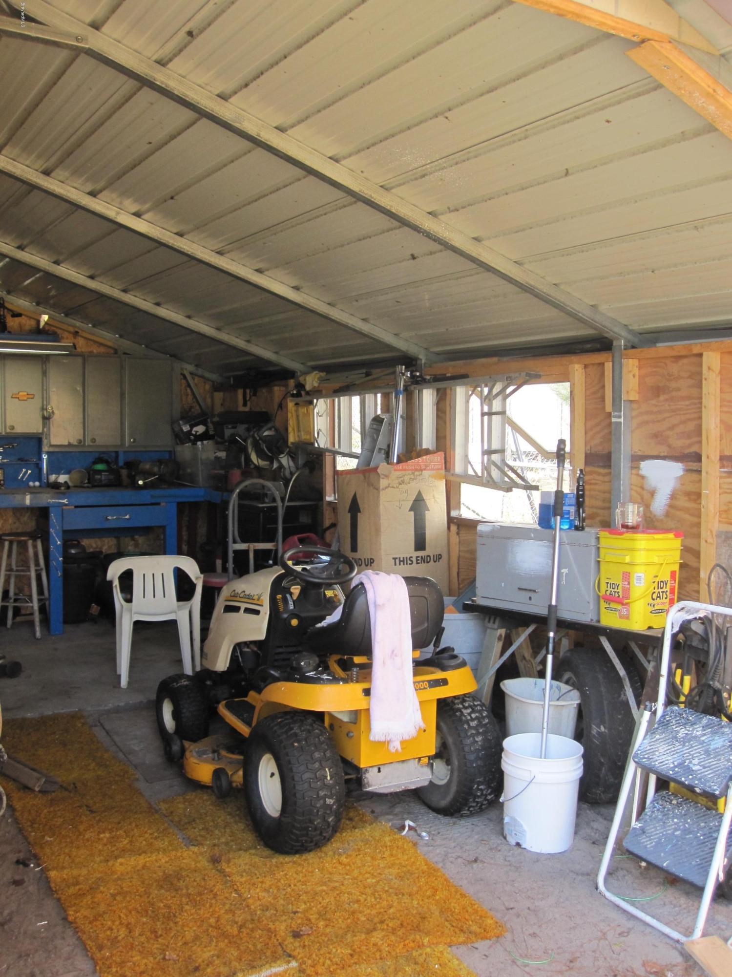 3074 Dover Road Mims, FL 32754 - Photo 25 of 27 Inside Workshop