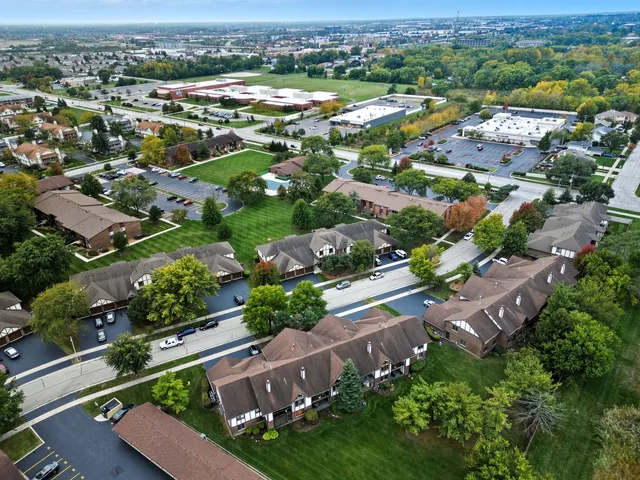 an aerial view of a house with outdoor space patio and mountain view