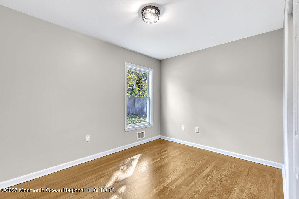 28 Maplecrest Drive Neptune Township, NJ 07753 - Photo 15 of 20 an empty room with windows