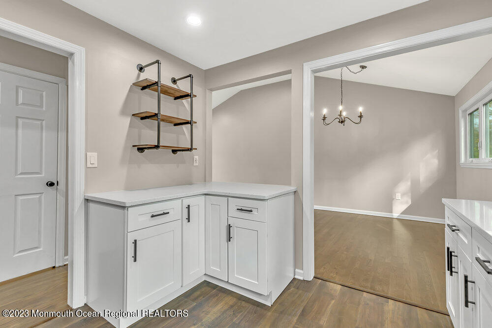 28 Maplecrest Drive Neptune Township, NJ 07753 - Photo 8 of 20 a view of cabinets and wooden floor