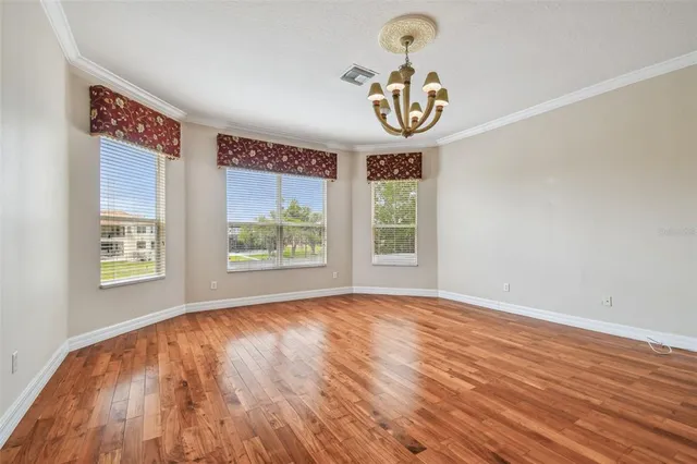 an aerial view of a house with yard swimming pool and outdoor seating