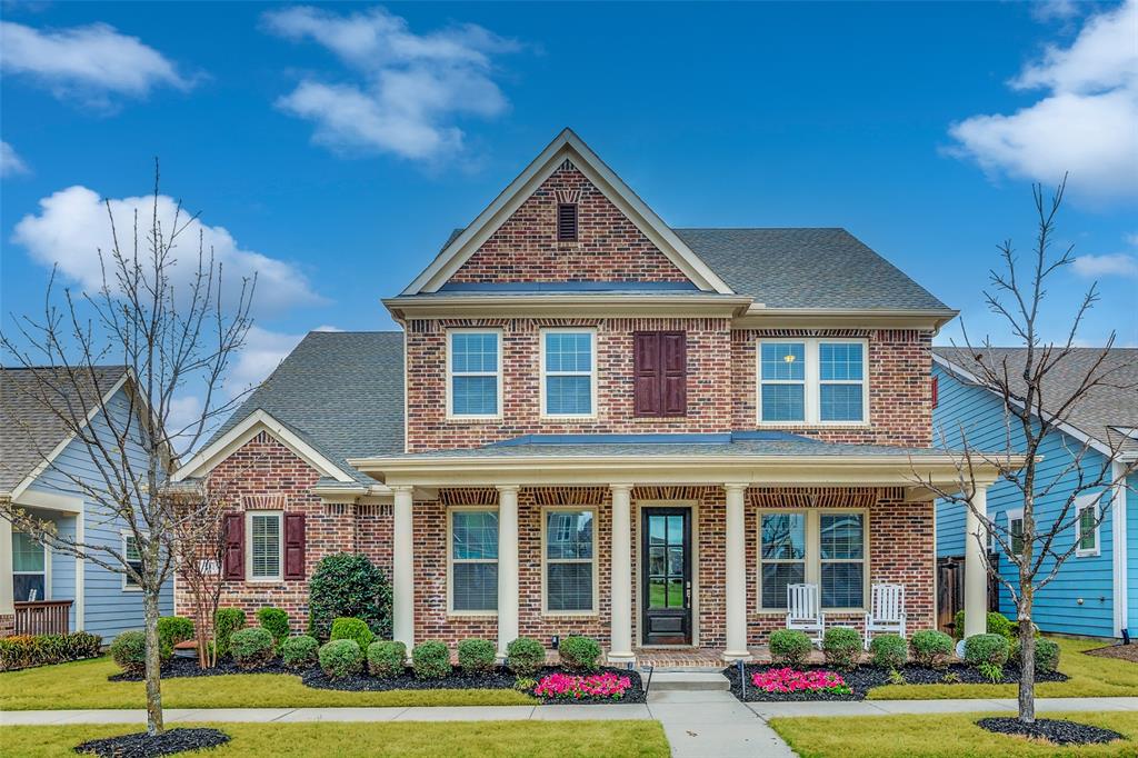 8917 Homestead Boulevard Rowlett, TX 75089 - Photo 1 of 40 a front view of brick house with a yard